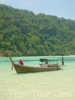 long-tailed boat for snorkeling
